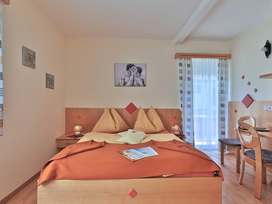 Bed in a standard double room.