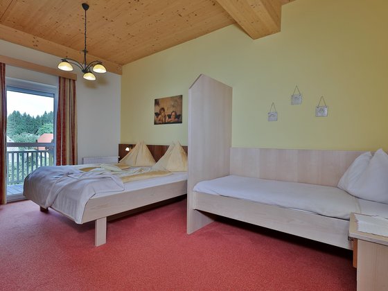 Superior triple room at Hotel Garni Zerza.