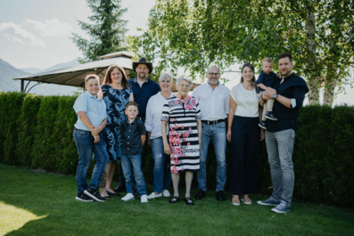 The Zerza family in the garden in front of the house.