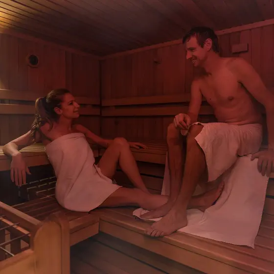 Couple in the sauna at Hotel Garni Zerza. Couple in the sauna at Hotel Garni Zerza.