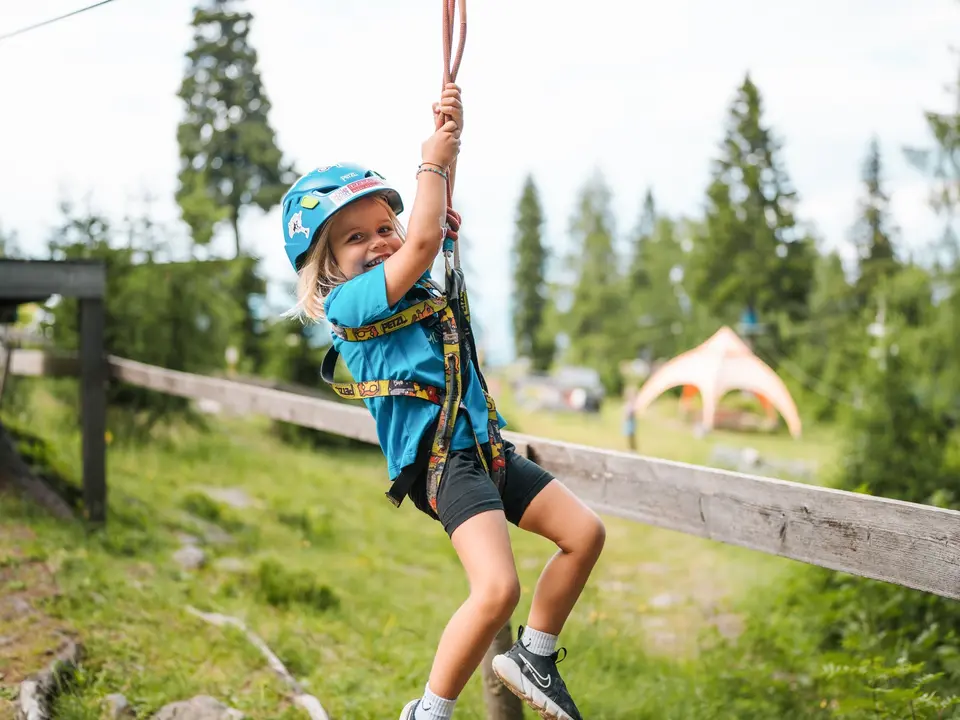Child on the Flying Fox (c) Martin Hofmann - nassfeld.at.