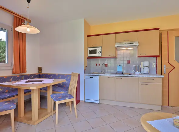 Dining area in the Family Apartment at Hotel Garni Zerza.