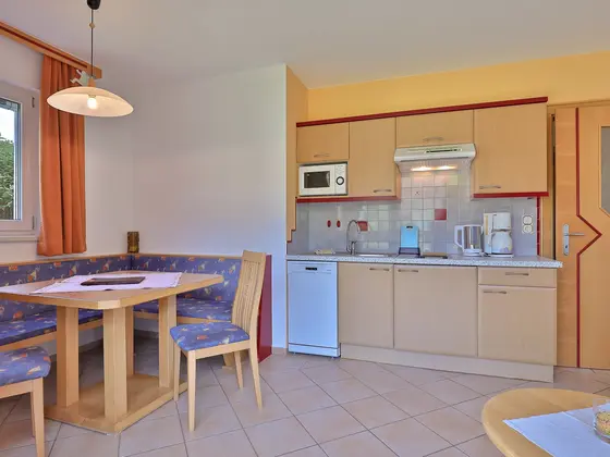 Dining area in the Family Apartment at Hotel Garni Zerza.