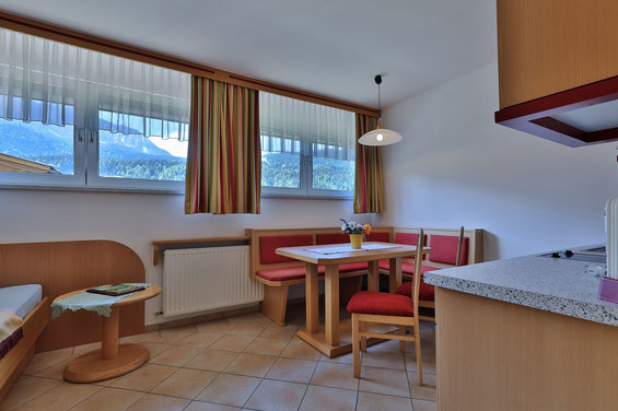 Living area in the Snow White apartment at Hotel Garni Zerza