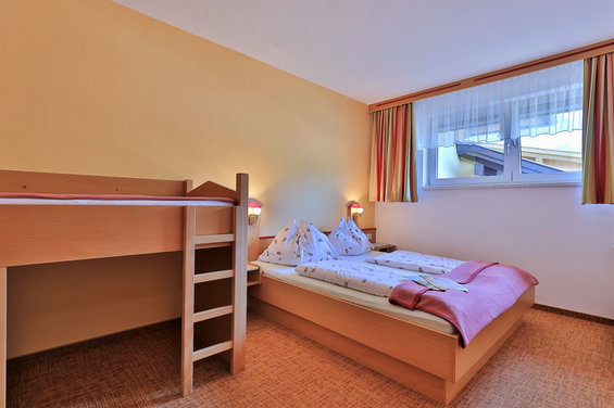 Bedroom in the Snow White apartment at Hotel Garni Zerza