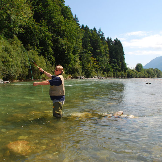 Fisherman in a lake at Nassfeld.