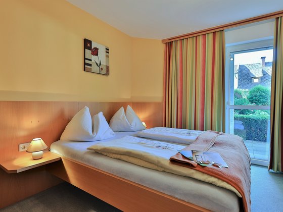 Bedroom in Apartment 1 at Hotel Garni Zerza.