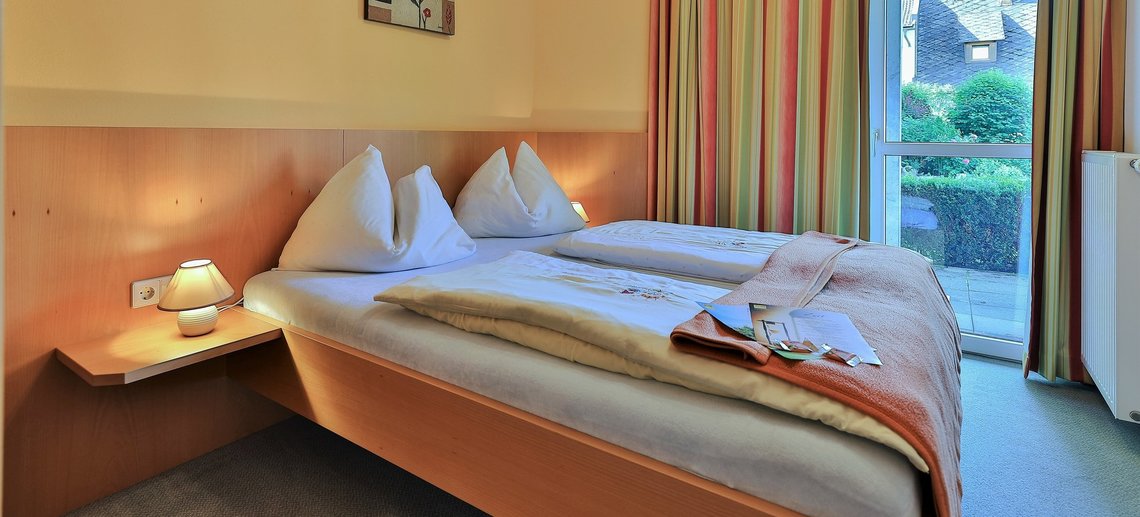 Standard triple room at Hotel Garni Zerza.